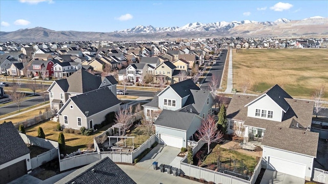 drone / aerial view with a residential view and a mountain view