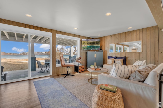 660 S Bear Lake Blvd, Garden City, UT 84028 - living room with wood walls, a water view, wood finished floors, an office area, and recessed lighting