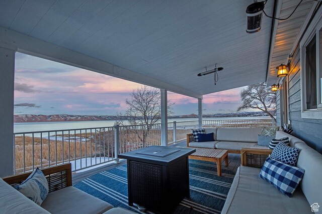 660 S Bear Lake Blvd, Garden City, UT 84028 - wooden terrace with a water view and an outdoor hangout area