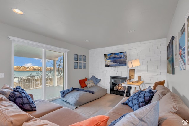 660 S Bear Lake Blvd, Garden City, UT 84028 - carpeted living area with a fireplace and recessed lighting