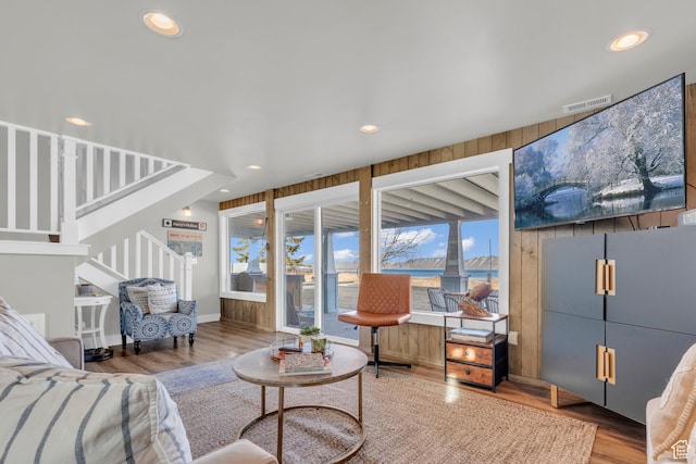 660 S Bear Lake Blvd, Garden City, UT 84028 - living area featuring wood finished floors, recessed lighting, and stairway