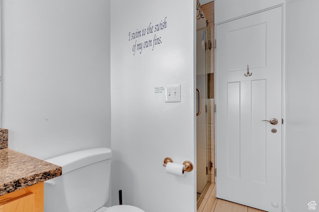 660 S Bear Lake Blvd, Garden City, UT 84028 - bathroom with a shower with door, toilet, and vanity