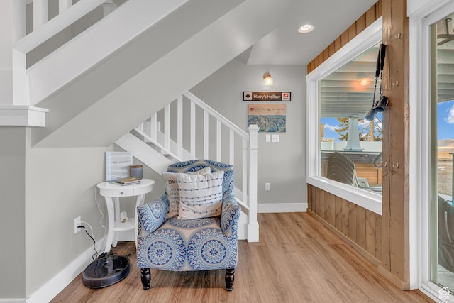 660 S Bear Lake Blvd, Garden City, UT 84028 - living area with light wood-type flooring, baseboards, and stairway