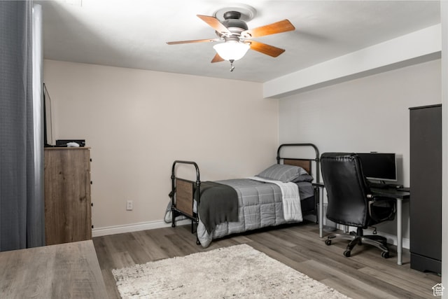 1348 W 200 S, Vernal, UT 84078 - bedroom with baseboards, ceiling fan, and wood finished floors
