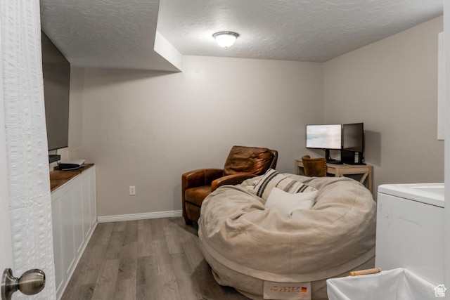 1348 W 200 S, Vernal, UT 84078 - sitting room with baseboards, a textured ceiling, and wood finished floors