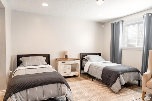 1348 W 200 S, Vernal, UT 84078 - bedroom with a textured ceiling, light wood-style flooring, and recessed lighting