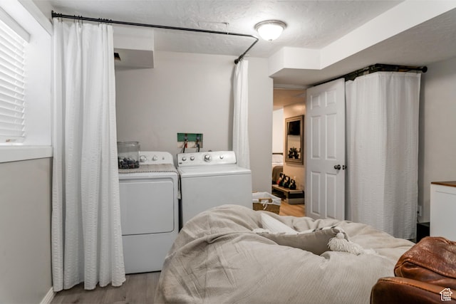1348 W 200 S, Vernal, UT 84078 - laundry area with a textured ceiling, independent washer and dryer, laundry area, and light wood-type flooring