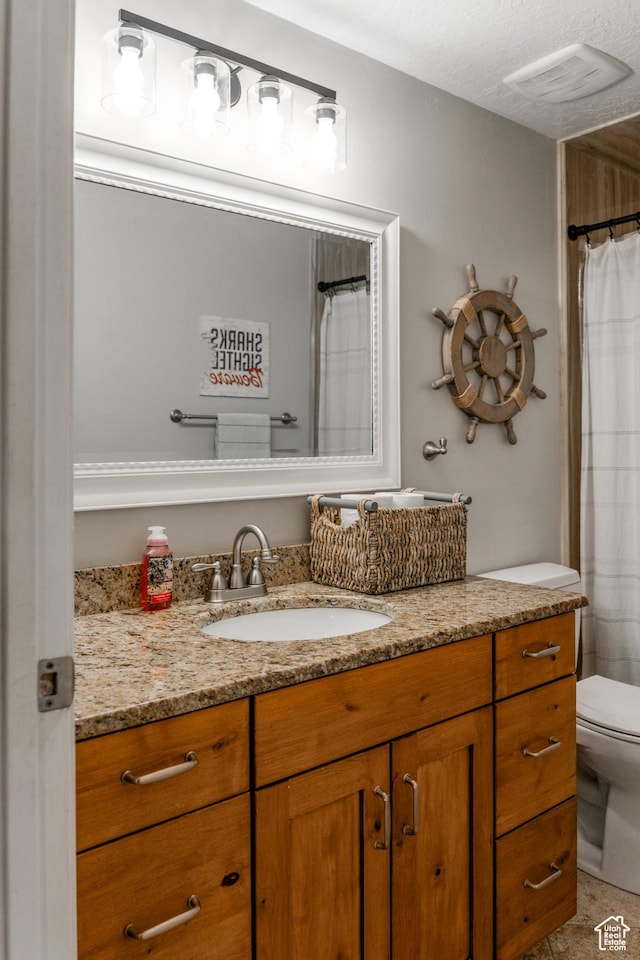 1348 W 200 S, Vernal, UT 84078 - bathroom with toilet, vanity, and visible vents