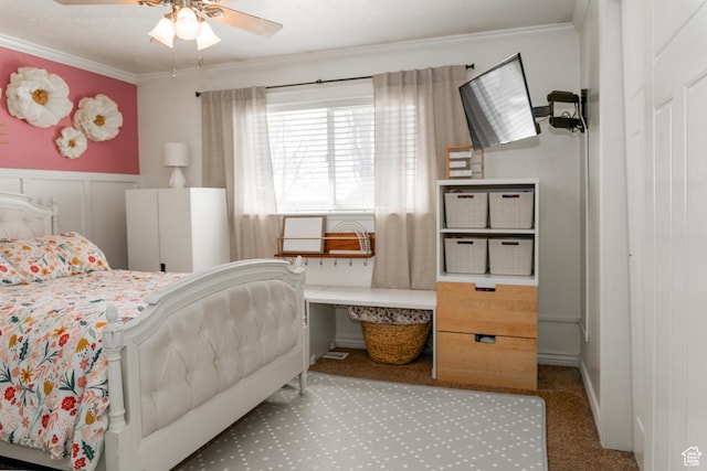 1348 W 200 S, Vernal, UT 84078 - bedroom with a wainscoted wall, crown molding, carpet floors, and a ceiling fan