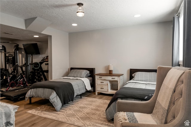1348 W 200 S, Vernal, UT 84078 - bedroom featuring light wood finished floors, recessed lighting, and a textured ceiling