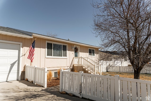 1348 W 200 S, Vernal, UT 84078 - view of front facade with a fenced front yard and an attached garage