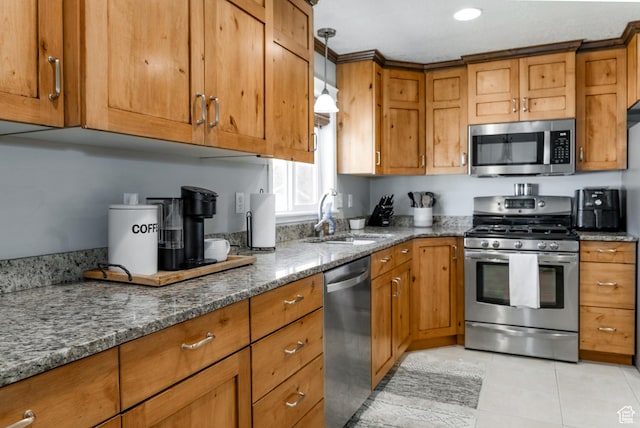 1348 W 200 S, Vernal, UT 84078 - kitchen with a sink, brown cabinetry, and appliances with stainless steel finishes
