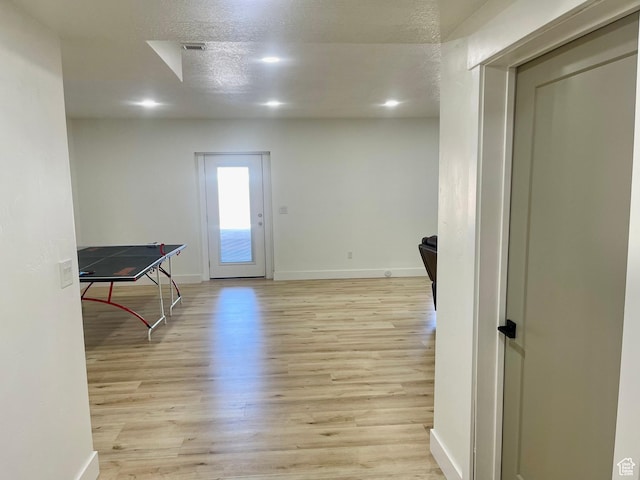9940 N Vande Way, Eagle Mountain, UT 84005 - interior space featuring light wood-style flooring, visible vents, baseboards, and a textured ceiling