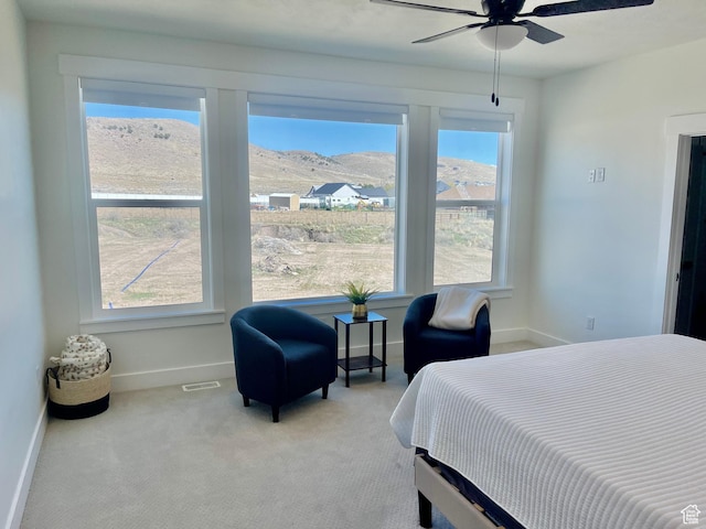 9940 N Vande Way, Eagle Mountain, UT 84005 - bedroom featuring carpet flooring, a ceiling fan, baseboards, visible vents, and a mountain view