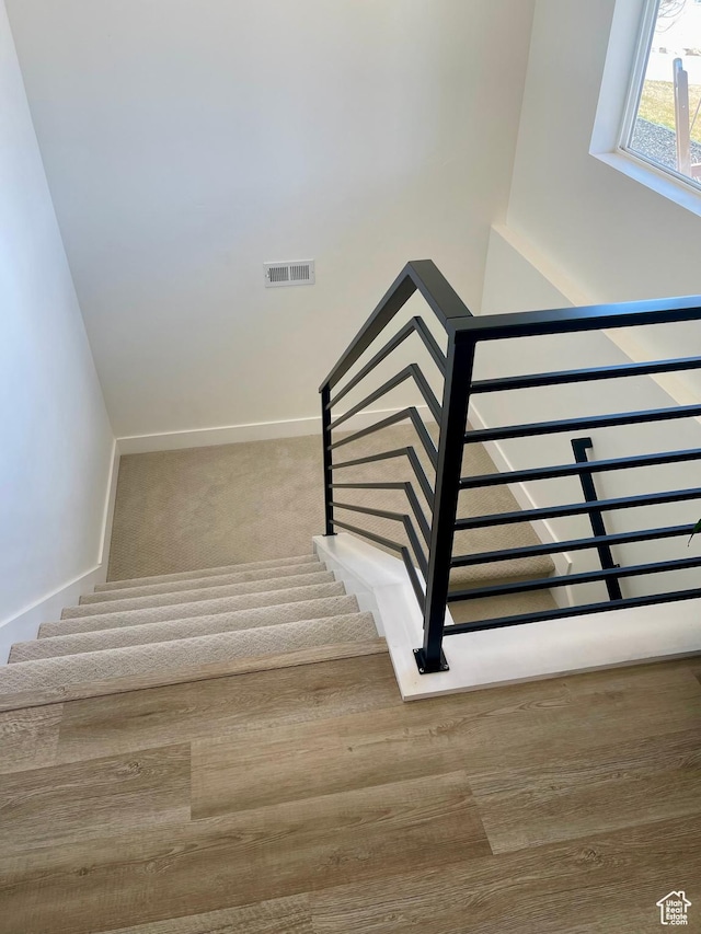 9940 N Vande Way, Eagle Mountain, UT 84005 - stairs featuring baseboards, visible vents, and carpet floors