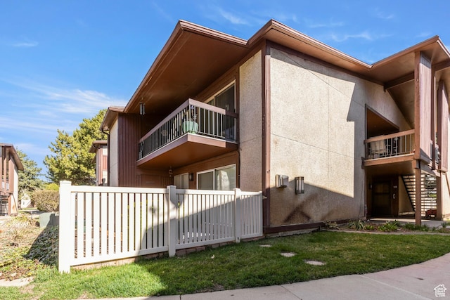 view of home's exterior with stucco siding