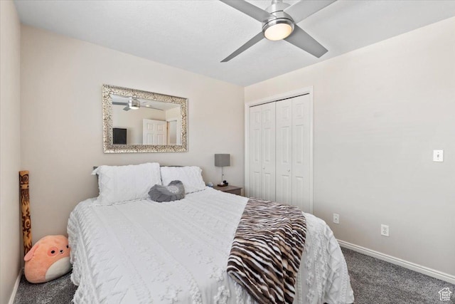 carpeted bedroom with baseboards, a closet, and ceiling fan
