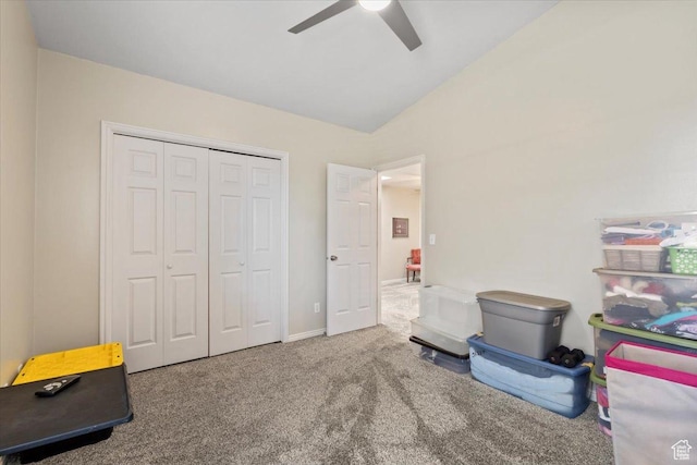 interior space featuring a closet, ceiling fan, and vaulted ceiling