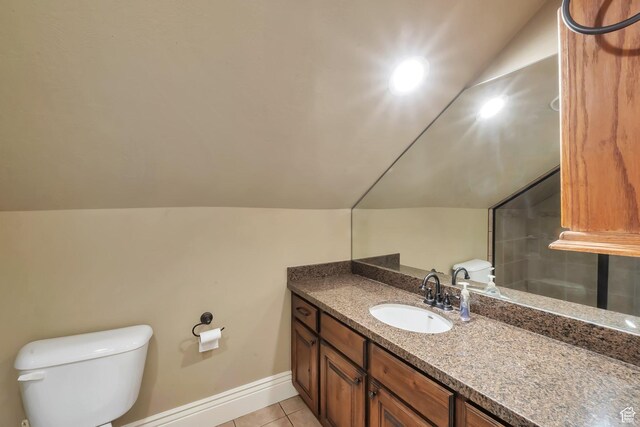 6092 W 13400 S, Herriman, UT 84096 - bathroom featuring vanity, baseboards, vaulted ceiling, tile patterned flooring, and toilet