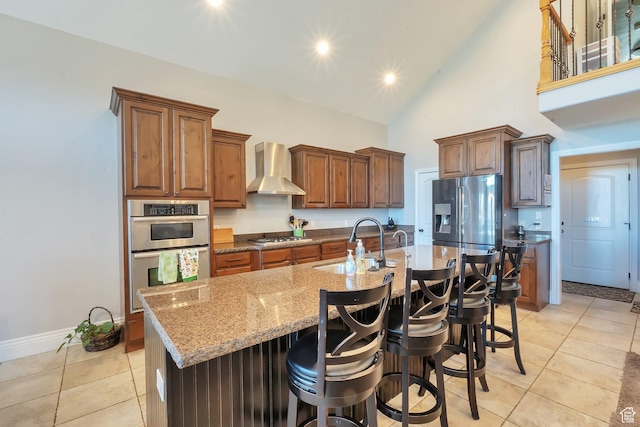 6092 W 13400 S, Herriman, UT 84096 - kitchen with light tile patterned floors, light stone countertops, wall chimney range hood, a sink, and stainless steel appliances
