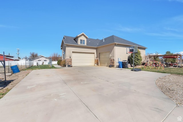6092 W 13400 S, Herriman, UT 84096 - view of front of home featuring concrete driveway, a garage, fence, and stucco siding