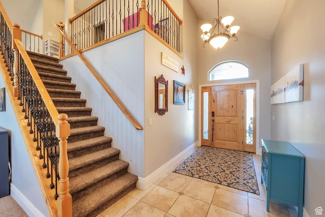 6092 W 13400 S, Herriman, UT 84096 - entrance foyer featuring light tile patterned floors, baseboards, an inviting chandelier, stairs, and high vaulted ceiling