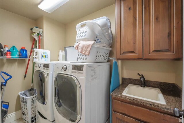6092 W 13400 S, Herriman, UT 84096 - clothes washing area featuring washing machine and dryer, a sink, and cabinet space
