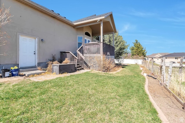 6092 W 13400 S, Herriman, UT 84096 - rear view of property with a yard, stucco siding, and fence