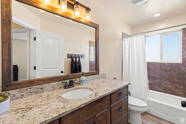 841 N Hale St Unit 1, Grantsville, UT 84029 - full bath featuring vanity, shower / tub combo with curtain, toilet, visible vents, and wood finished floors