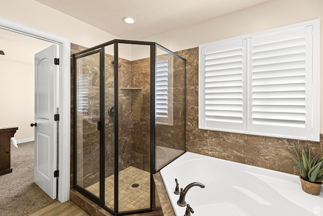 841 N Hale St Unit 1, Grantsville, UT 84029 - full bath with a stall shower, a garden tub, and recessed lighting