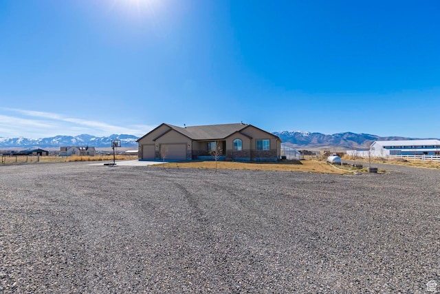 841 N Hale St Unit 1, Grantsville, UT 84029 - view of front of home with a mountain view and an attached garage