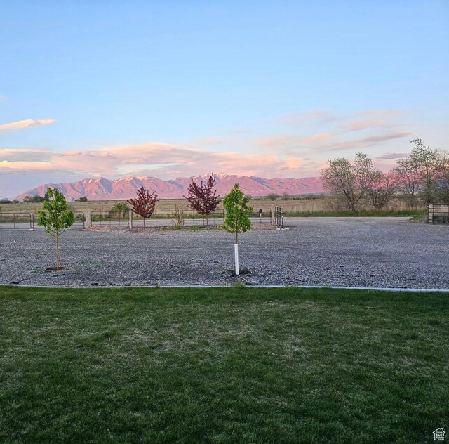841 N Hale St Unit 1, Grantsville, UT 84029 - yard at dusk with a rural view and a mountain view