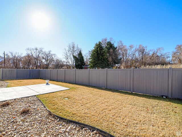 3631 W Cornstalk Way S, Riverton, UT 84065 - view of yard with a patio and a fenced backyard