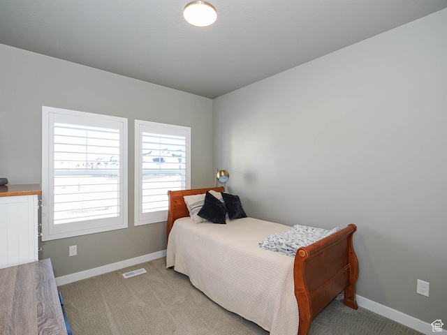3631 W Cornstalk Way S, Riverton, UT 84065 - bedroom featuring baseboards, light colored carpet, and visible vents