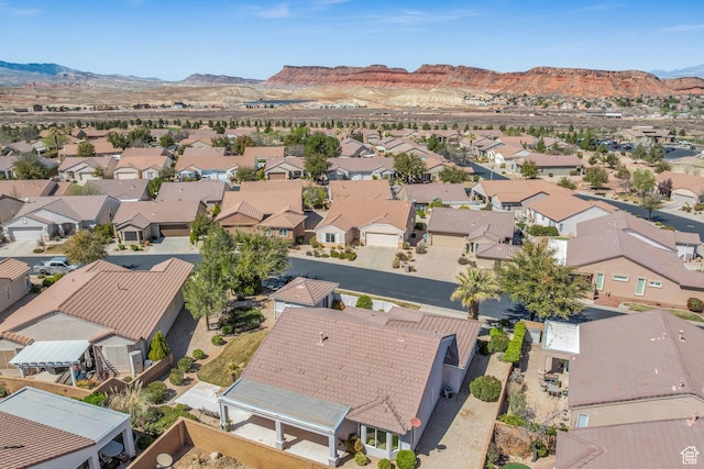 aerial perspective of suburban area featuring a mountain backdrop