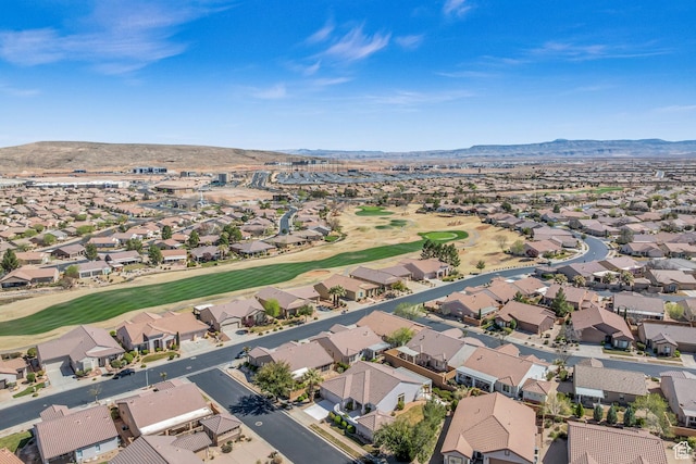 1673 W Warm River Dr, St George, UT 84790 - aerial perspective of suburban area featuring mountains and a golf club