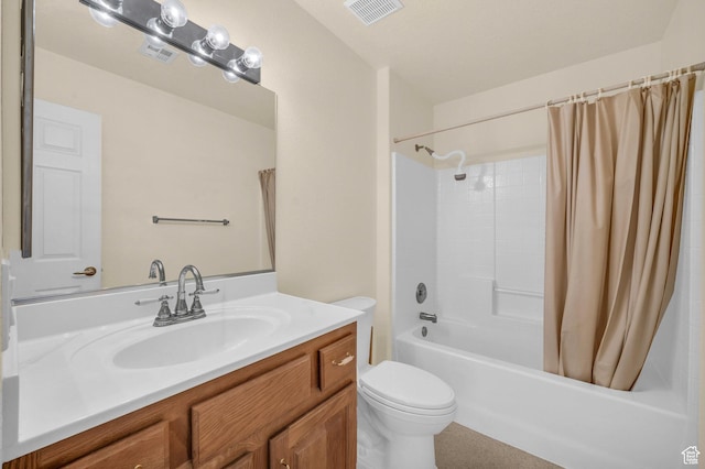 bathroom with toilet, shower / bath combo with shower curtain, and vanity