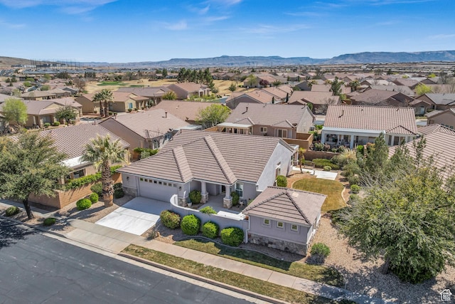 aerial perspective of suburban area with mountains
