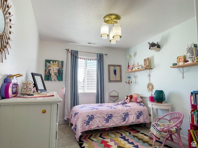 446 E Rue De Paris, Vineyard, UT 84059 - bedroom featuring a chandelier, visible vents, and a textured ceiling