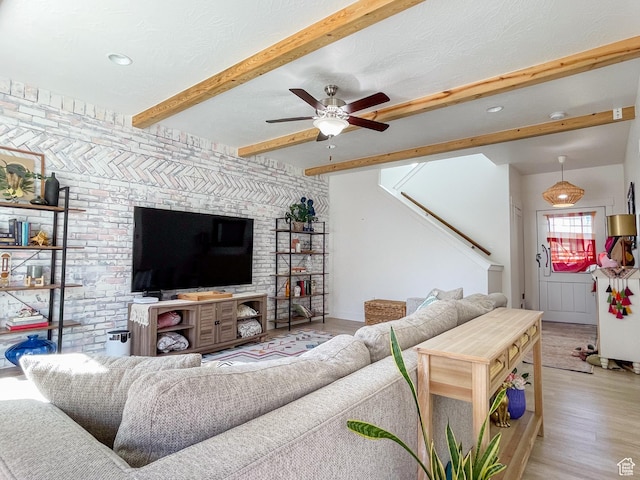 446 E Rue De Paris, Vineyard, UT 84059 - living room featuring ceiling fan, beam ceiling, and light wood-style floors