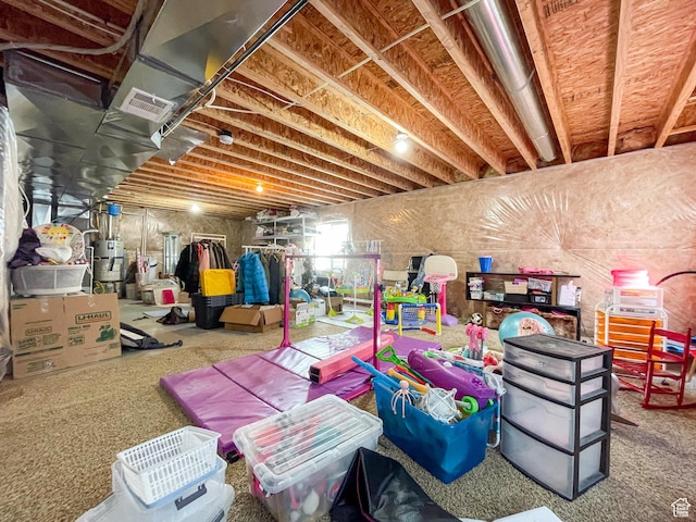 446 E Rue De Paris, Vineyard, UT 84059 - below grade area featuring secured water heater, visible vents, and carpet floors