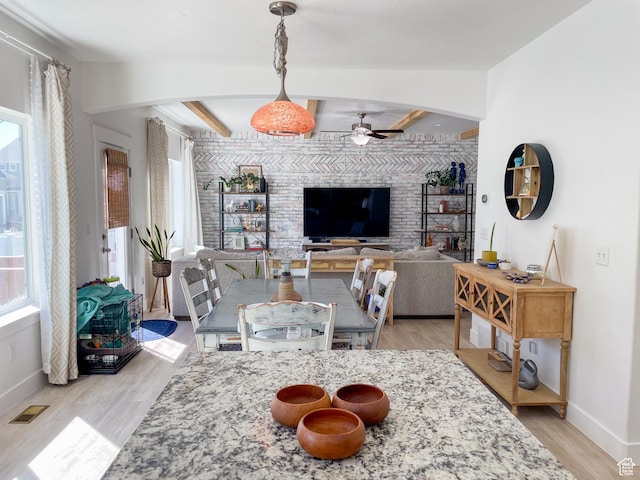446 E Rue De Paris, Vineyard, UT 84059 - living area featuring light wood finished floors, visible vents, ceiling fan, and baseboards