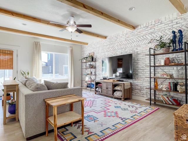 446 E Rue De Paris, Vineyard, UT 84059 - living area featuring beamed ceiling, a ceiling fan, wood finished floors, and brick wall