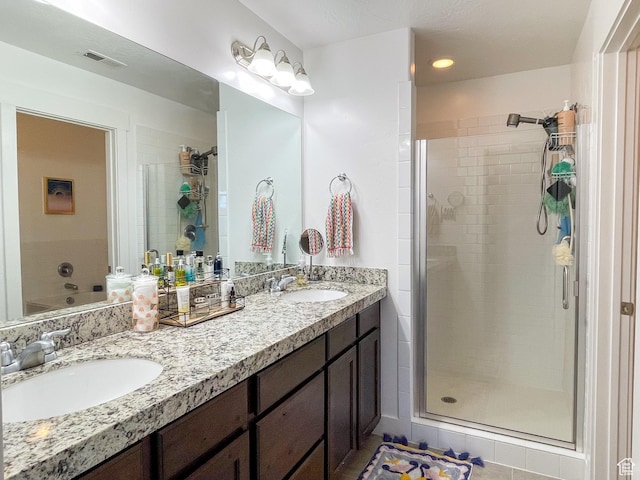 446 E Rue De Paris, Vineyard, UT 84059 - full bath featuring double vanity, visible vents, a stall shower, and a sink