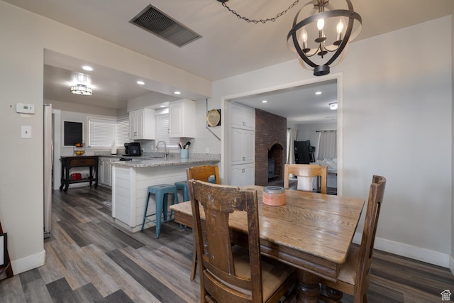 380 S 100 E, Vernal, UT 84078 - dining space with visible vents, a chandelier, baseboards, wood finished floors, and recessed lighting