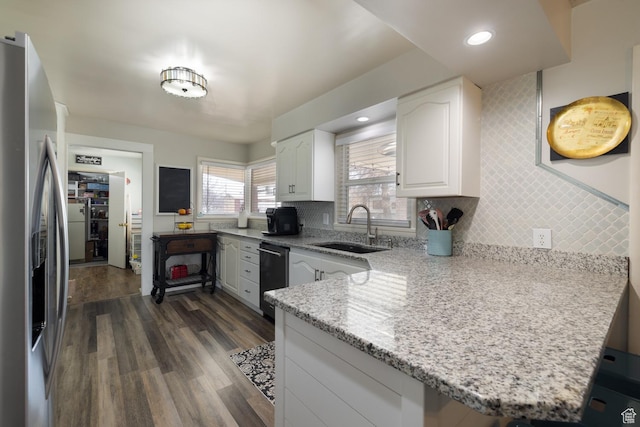 380 S 100 E, Vernal, UT 84078 - kitchen with a sink, stainless steel fridge with ice dispenser, a peninsula, dark wood-style floors, and white cabinets