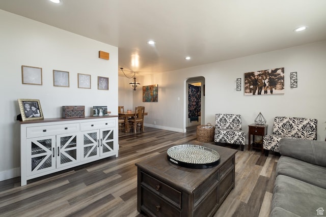 380 S 100 E, Vernal, UT 84078 - living room featuring dark wood finished floors, baseboards, arched walkways, and recessed lighting