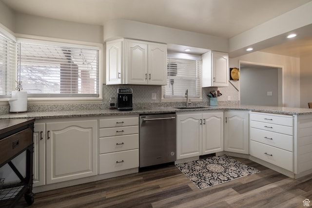 380 S 100 E, Vernal, UT 84078 - kitchen featuring a sink, dishwasher, a peninsula, decorative backsplash, and dark wood-type flooring