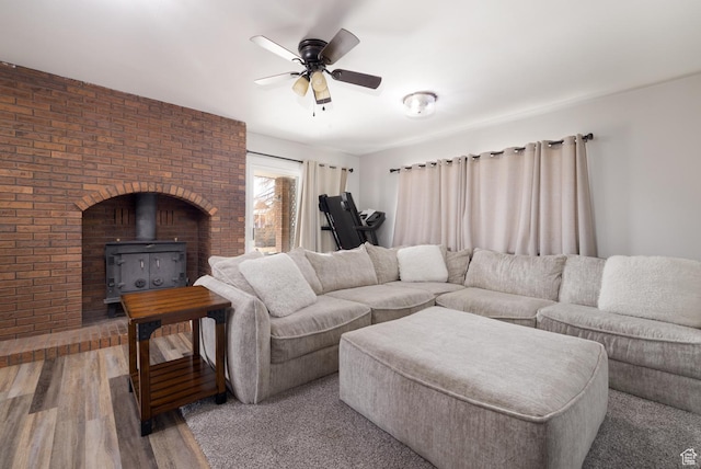 380 S 100 E, Vernal, UT 84078 - living room featuring ceiling fan, wood finished floors, and a wood stove