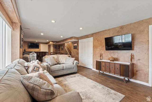 7217 W Mccuiston Ave S, Herriman, UT 84096 - living area featuring baseboards, recessed lighting, wood finished floors, and stairway